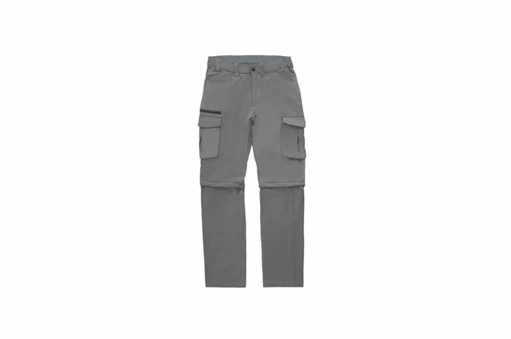 sur un fond blanc, il y a un pantalon de randonnée convertible gris. il a 2 poches. il est possible de le raccourcir en short grâce aux fermetures éclair à l'entre jambe.